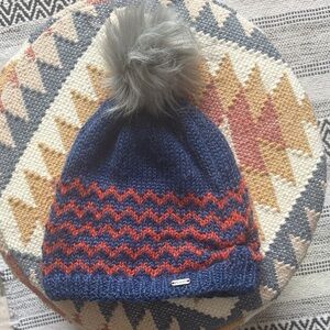Pistil Blue and Orange Knit Hat with Pom-Pom